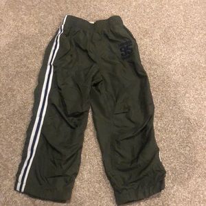 Olive green swoosh pants